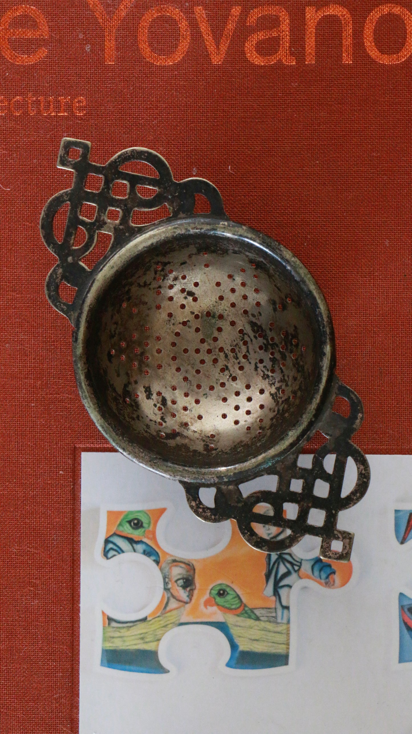 Vintage Silver-Plated Tea Strainer with Ornate Handles